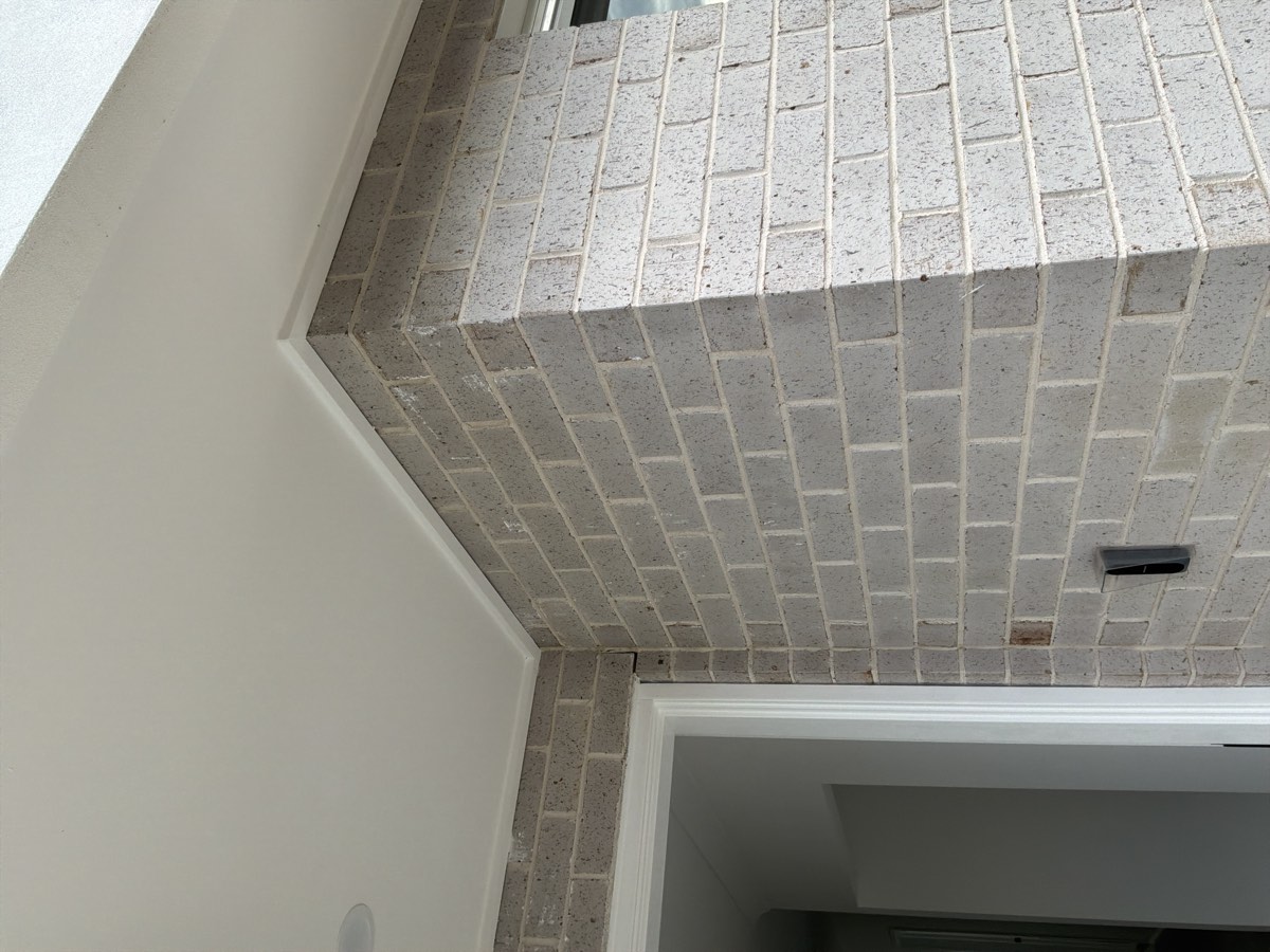 Brickwork awaiting cleaning at handover, Box Hill