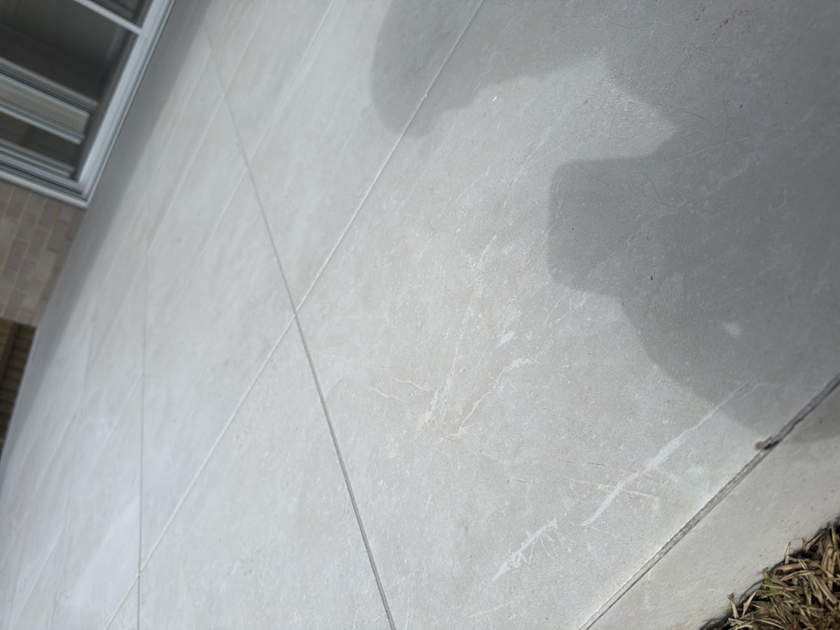 Cracked and chipped external tiling, Box Hill