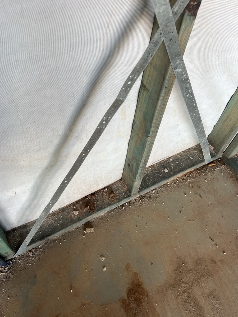 M10 and M12 tie down bolt missing, recorded during a frame inspection in Box Hill